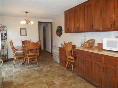 Tons of cabinet space and large eating area that g
