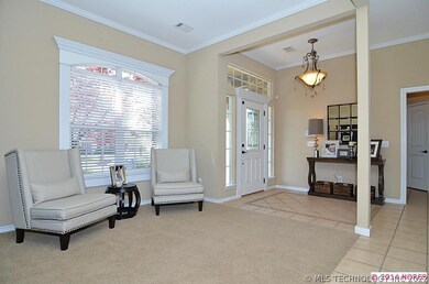 Formal living room off the entry could easily be u