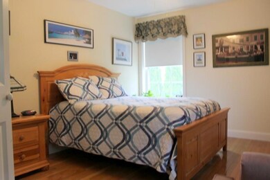 Bedroom 1 With Hardwood Floors