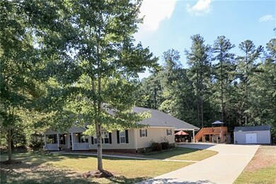 View of front of home and side view with wide conc