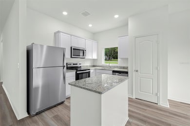 13469 Leaping Water Way, Astatula, FL 34705 - photo 3