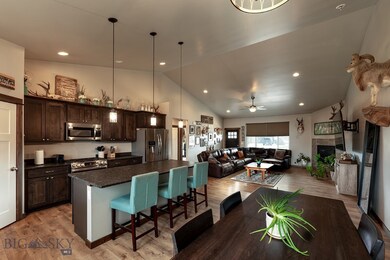 Kitchen with large bar and solid surface counterto