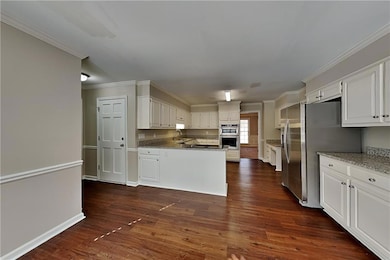 Kitchen with a sink, appliances with stainless ste