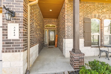 This welcoming front entryway offers recessed lighting and plenty of room for a seating area, perfect for watching front yard​​‌​​​​‌​​‌‌​​​‌​​‌‌​​‌‌​‌​​​‌‌​​‌​​​​​‌ activities.