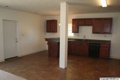 Front door enters into the Kitchen.