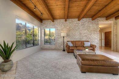 Living Room w/ High Beam Ceiling