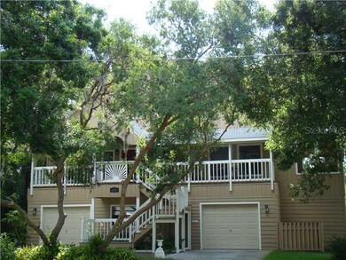 Exterior Front - Tree shaded front elevation with a welcoming front porch