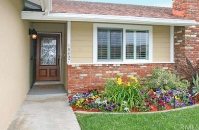 Great Curb Appeal with Brick Siding & Lovely Lands