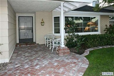 Professional Landscaping, Brick Walkway, and Charm