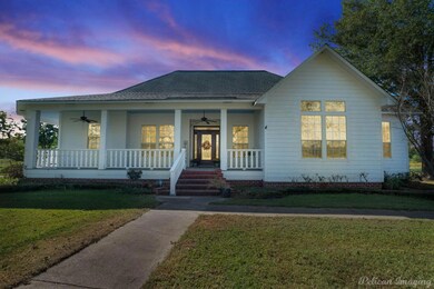 View of front of property featuring covered porch,
