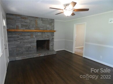 Stone fireplace in Den