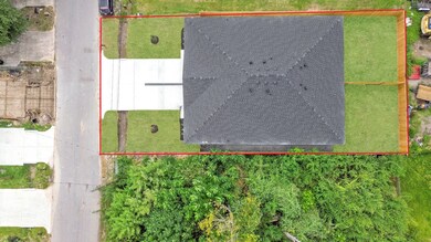 This aerial view showcases the 7,049 sqft Lot.