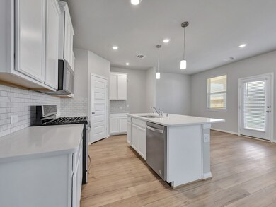 Photo is not of the actual home, but is an inspirational photo of builder’s model home and may depict options, furnishings, and/or decorator features that are not included