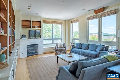 The living area features floor to ceiling built-in
