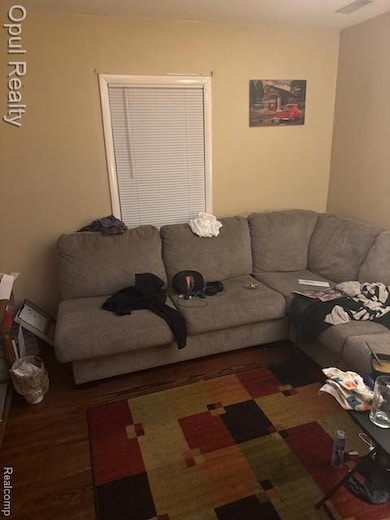 Living room with dark wood-style floors