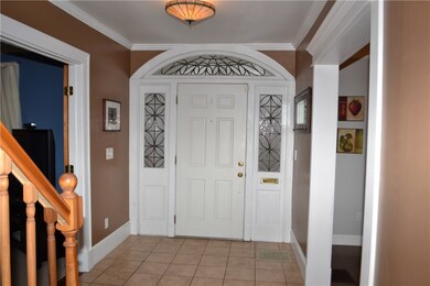 Entry with ceramic tile flooring