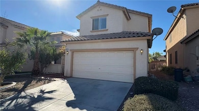 Mediterranean / spanish house featuring a tiled roof, concrete driveway, stucco siding, and a garage