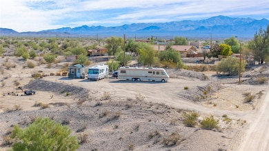 Birds eye view of property featuring a mountain vi