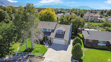Aerial perspective of suburban area with a mountain backdrop