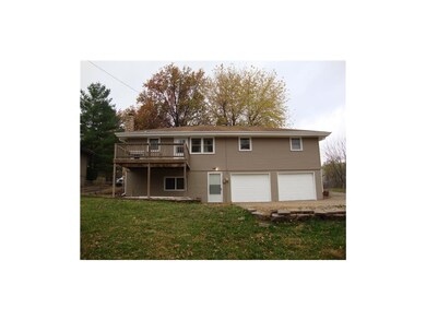 Back of property with new vinyl siding!