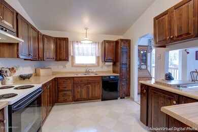 Spacious kitchen with snack bar dining