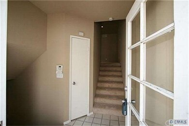 LOOKING IN FRONT DOOR