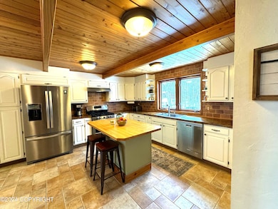 Tile floor, large eat in kitchen