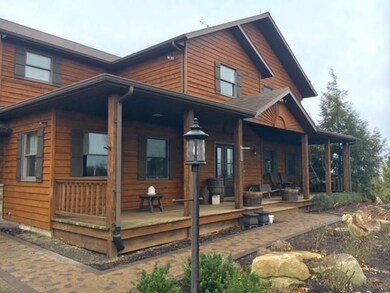 Welcoming Full Covered Front Porch for relaxing ou