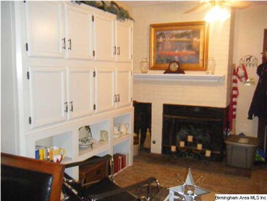 Lovely brick FP and extra cabinet storage in Break