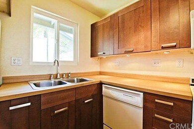 Upgraded kitchen with newer cabinets, lighting, di