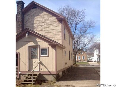 Exterior Back. Back porch as been turned into a la