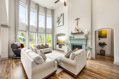 Bright open living area with floor-to-ceiling wind
