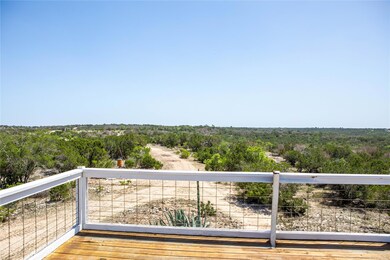 Wooden deck with a view of trees