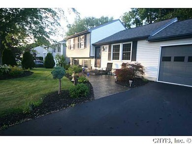 Exterior Front. Stampcrete walkway and meticulous 