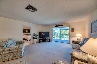 spacious living area with sliding doors to lanai