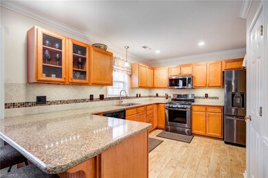 Huge kitchen with New Granite Counters, New BIG undermount sink, Newhands free Moen faucet, New Black Stainless Steel Appliances and more!