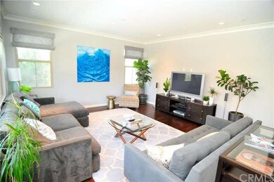 living room opens to kitchen & dining area