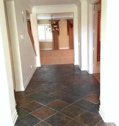 Beautiful Rich Slate Flooring at entry and downsta