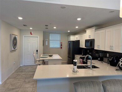 Purple Chair Condo at Storey Lake Resort unit 104, Kissimmee, FL 34746 - photo 2