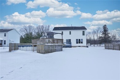 Above ground pool with attached deck & privacy fen