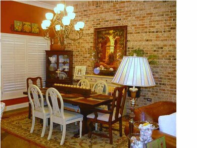 Dining room with brick accent way