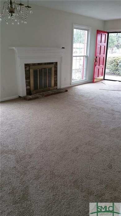 LIVING ROOM WITH WOOD BURNING FIREPLACE
