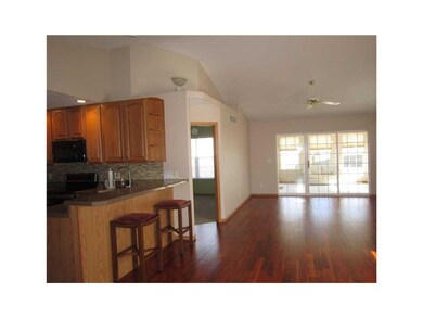 Great Room. Open floor plan with breakfast bar lea