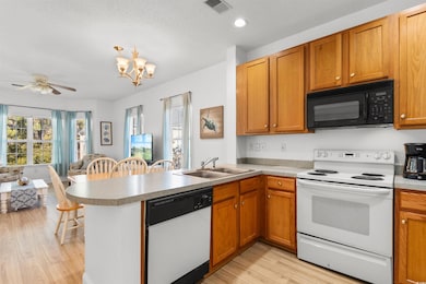 Kitchen featuring sink, light hardwood / wood-styl