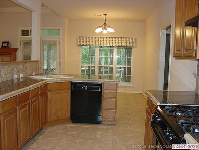 View of kitchen towards breakfast nook overlooking