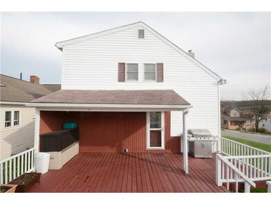 Exterior Back. Huge Back Deck.  One deck box is in