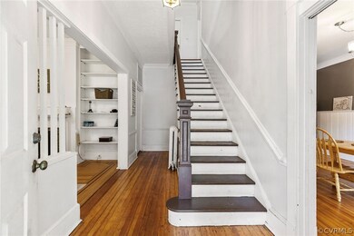 Stairs with wood-type flooring, built in features,