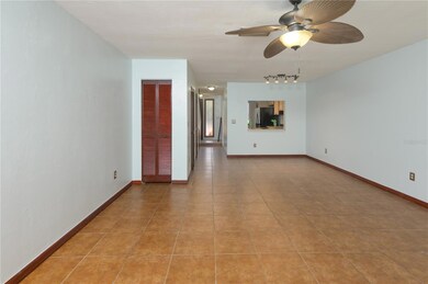 view of the living and dining area from the sliding door to backyard