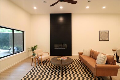 Living room with fireplace centerpiece