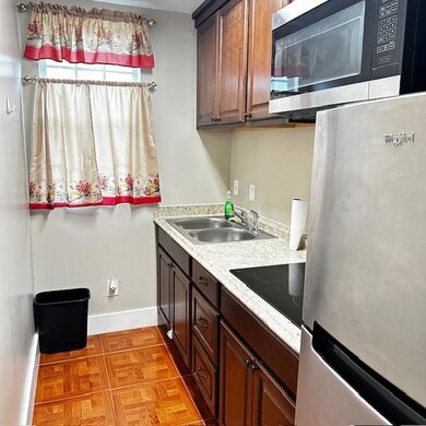 Kitchen featuring sink, appliances with stainless 